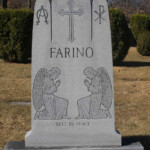 Guardian angels in Resurrection Cemetery. Farino. Photo by Gioconda Coello