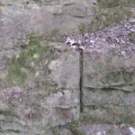 Drill holes from quarrying still visible. Photo by CS Thomson.